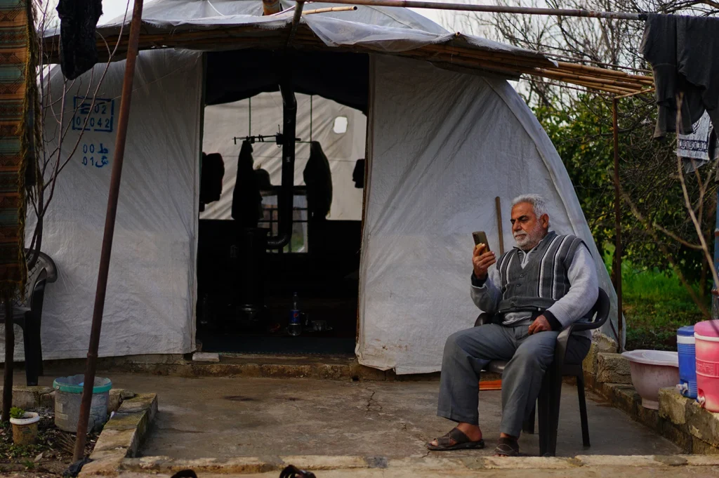 badr al din bakro 75 outside tent